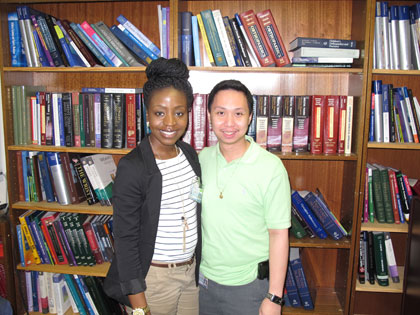 Jalisa Brown (l.) with her supervisor Carlo Crucero. Mr. Crucero employs several Plaza College alumni at SUNY Downstate Hospital.